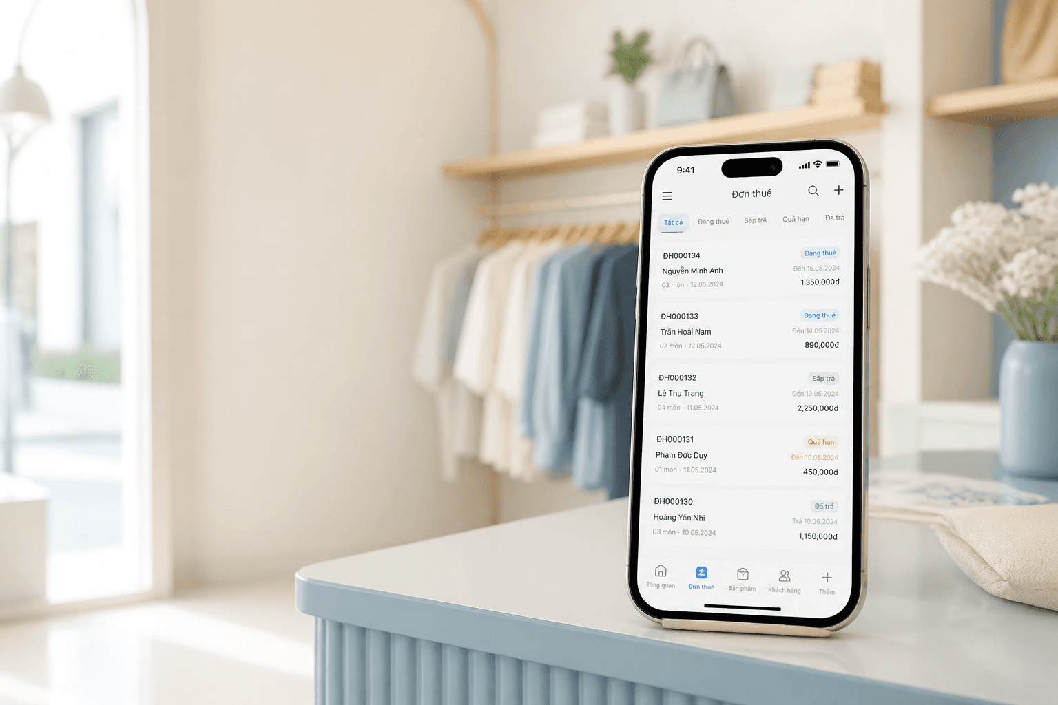 AnyRent rental shop management on mobile in a boutique